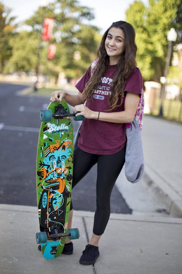 Hendersonville, Tenn., sophomore Mariah Gonzalez rode her longboard Wednesday on Normal Street. Students on campus at WKU use various forms of transportation around the Hill. Some do it for fun and others, for efficiency. Alyse Young and Shaban Athuman/HERALD