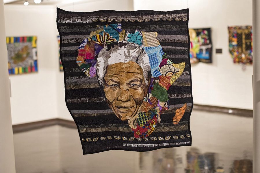 “Tata: The Father of a Nation,” a quilt by April Shipp, hangs in the Kentucky Museum on Friday. It is part of an upcoming exhibit showcasing various quilts remembering and celebrating the life of Nelson Mandela. According to Shipp, the word 