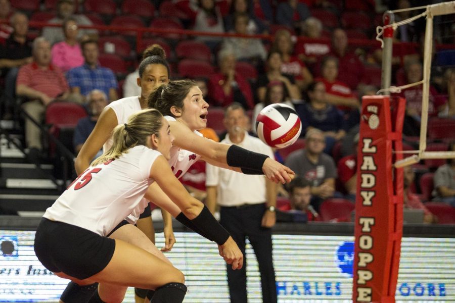 Sophomore outside hitter Jackie Scott (24) and senior outside hitter Rachel Engle (15) go for the ball during WKU’s 3-0 win against Louisiana Tech on Friday. Scott and Engle recorded three and five kills respectively in the Lady Toppers’ win over the Lady Techsters. Shaban Athuman/HERALD
