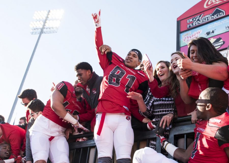 December 5, 2015: Western Kentucky wide receiver Kylen Towner (81) celebrates with fans after defeating Southern Miss in the Conference USA championship game at L.T. Smith Stadium in Bowling Green, Kentucky. Nick Wagner/HERALD