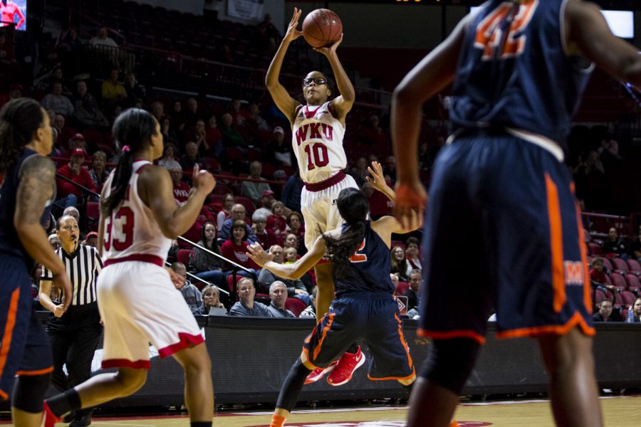 WKUs forward Tashia Brown (10) goes for a jump shot over University of Texas at El Paso guard Cameasha Turner (2) during the Lady Toppers 85-78 loss to University of Texas at El Paso on Saturday Feb. 6 at E.A, Diddle Arena in Bowling Green, Ky. Brown went for 11-17 in field goals. Shaban Athuman/HERALD