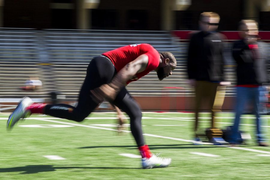 Tight end George Fant (44) runs the three cone drills for NFL scouts during the WKU football team’s Pro Day on Tuesday at Smith Stadium. SHABAN ATHUMAN/HERALD