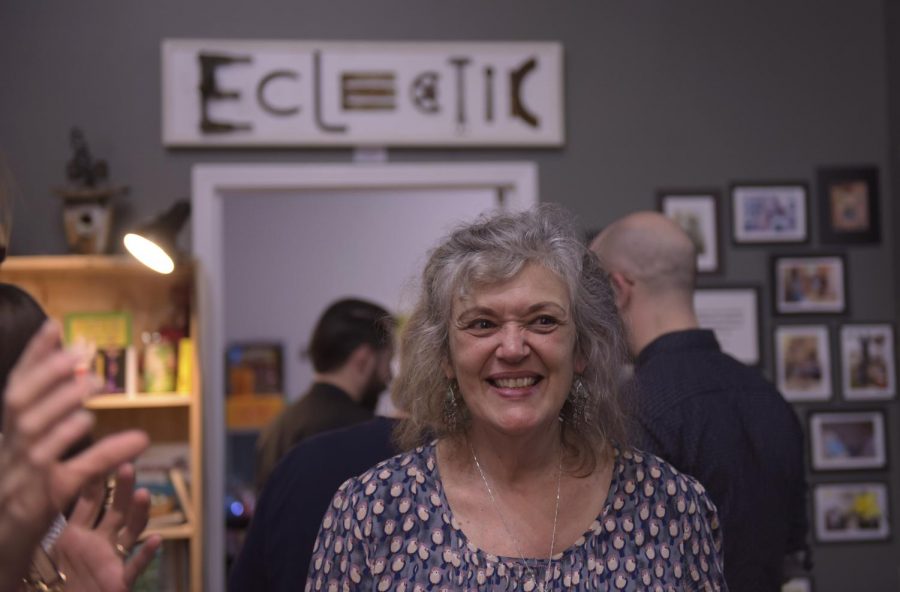 Theresa+Christmas%2C+owner+of+Art+Matters%2C+smiles+and+greets+guests+at+her+venue+for+the+March+18+Gallery+Hop.+Christmas+has+been+involved+with+the+Bowling+Green+Gallery+Hop+ever+since+she+opened+her+business+five+years+ago.+Art+Matters+is+located+in+downtown+Bowling+Green+and+offers+art+classes+for+children.+Abbey+Tanner%2FHERALD