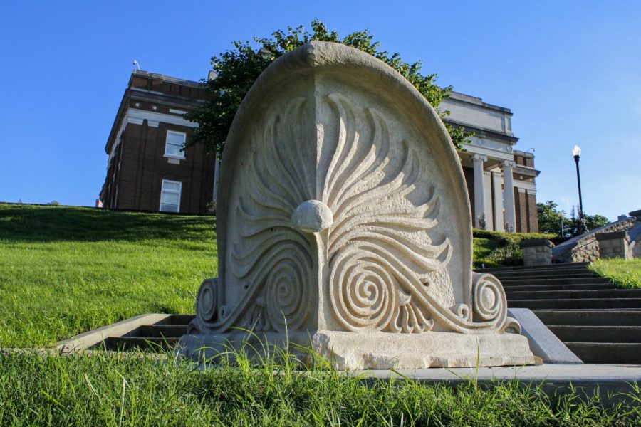 The Van Meter Hall roof cornerstone, with its unique architecture, sits on display Sunday, August 21, 2016 on the front lawn of Van Meter Hall. 
