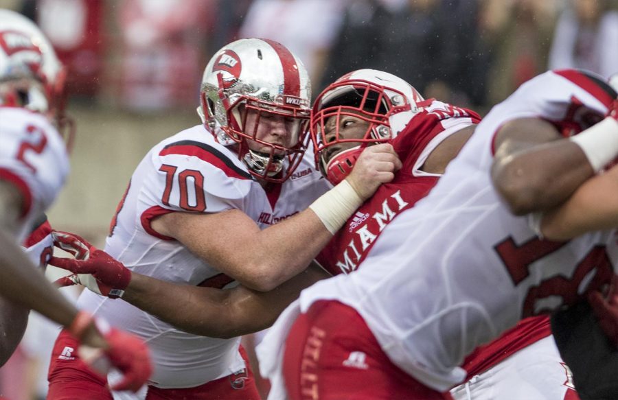 Western Kentucky University offensive lineman Max Halpin (70) fights with a University of Miami (Ohio) during their 31-24 win on Saturday, September 17th, 2016 in Oxford, Ohio.