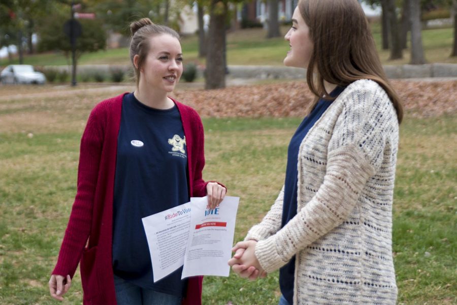 Crestwood junior Elizabeth Trader talks to fellow Ride To Vote volunteer, Olive Hill junior Alexandria Knipp about the problems they have faced with student voters on Tuesday, Nov. 8 near Avenue of Champions. WKUs Student Government partnered with Ride To Vote to help all students make it to the polls but most students Trader and Knipp encountered were either not registered in Bowling Green or have absentee voted.