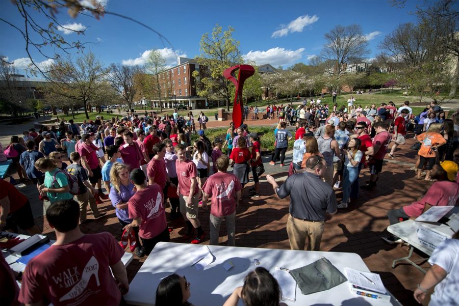 Fraternities+gather+on+Centennial+Mall+before+the+start+of+Walk+A+Mile+in+Her+Shoes.+Fraternity+members+march+to+stop+rape%2C+sexual+assault+and+gender+violence.+The+men+put+on+high+heel+shoes+before+walking+a+mile+around+campus+to+experience+what+its+like+to+walk+in+a+womans+shoes.%C2%A0