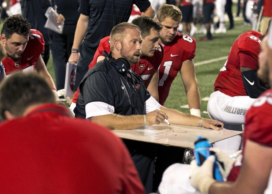 First-year offensive line coach Geoff Dartt, who will turn 34 this December, had an operation on Oct. 13 to remove two brain tumors. Head coach Mike Sanford said several players wrote Coach Dartt on their arm tape during the Hilltoppers game against Charlotte the day after Dartts surgery. Photo Credit: Steve Roberts-USA TODAY Sports