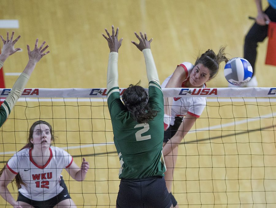 WKU outside hitter Alyssa Cavanaugh (7) spike the ball for a kill against Charlotte Nov 17 during the Conference USA championship held in Diddle Arena.