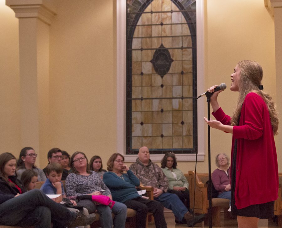 Katie Vogel sings solo at The Treblemakers/Redshirts concert at First Christian Church on Saturday, Nov. 11