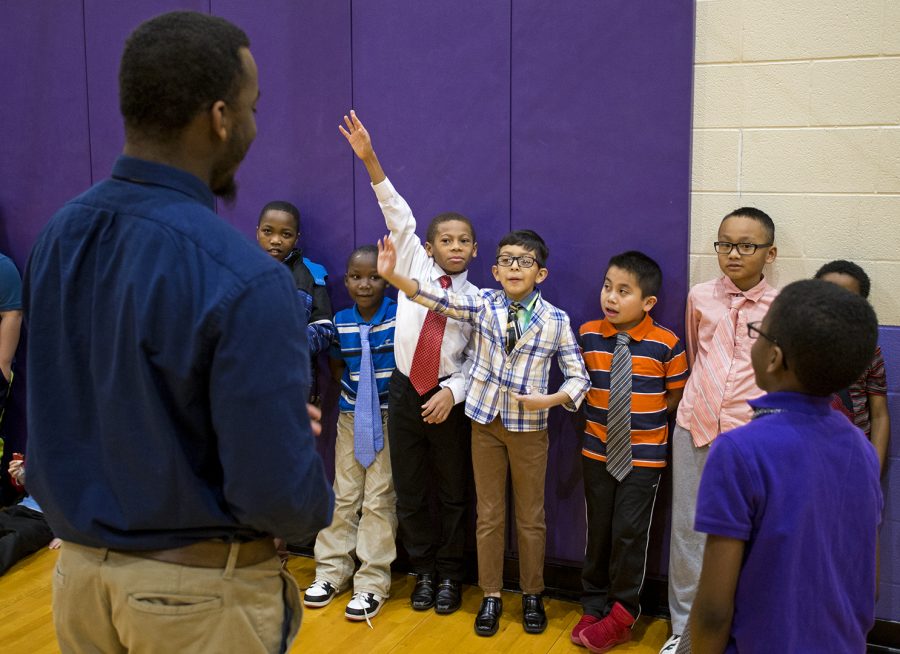 Tyreon Clark talks to the Boys 2 Men leadership kids before they go to class at Parker Bennet Curry Elementary School on Friday Feb. 2, 2018. Clark was raised in Bowling Green and went to Parker Bennet as a child. You dont see a lot of young men that come back and give back to their community, he said. Clark is also expanding the program to other schools in the district. I want these kids to have better than I had.