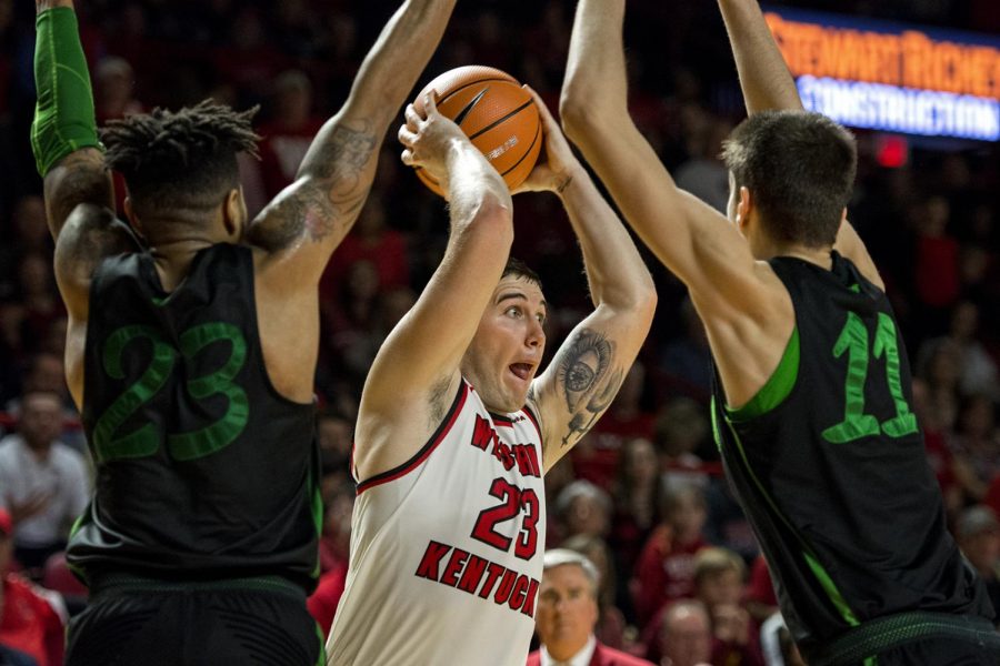 WKU+forward+Justin+Johnson+looks+for+a+pass+against+the+Marshall+Thundering+Herd+at+E.A.+Diddle+Arena+on+Saturday%2C+January+27.+Johnson+racked+up+8+points+and+12+rebounds+in+the+85-74+win.