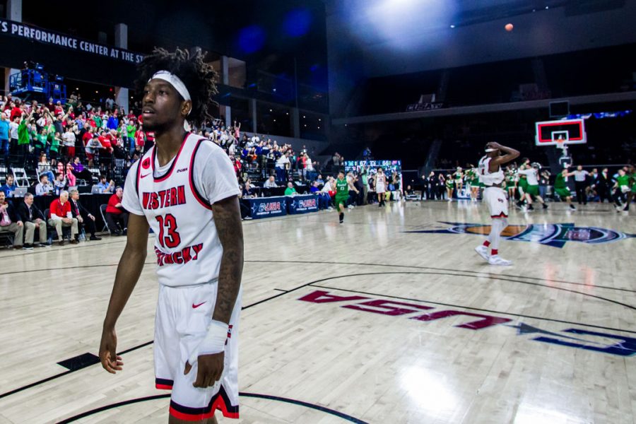 WKU Guard Taveion Hollingsworth (13) walks away following the Hilltoppers 67-66 loss in the championship game of the Conference USA tournament against Marshall University on Saturday March 10, 2018 at The Star in Frisco, Tx.