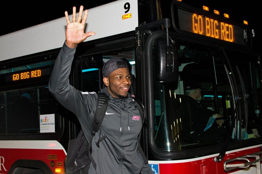 Graduate student Dwight Coleby steps off the bus in front of Diddle Arena after returning to Bowling Green from Oklahoma March 21. The Hilltoppers beat Oklahoma State University 92-84 which advanced them to the semifinal round of the NIT.