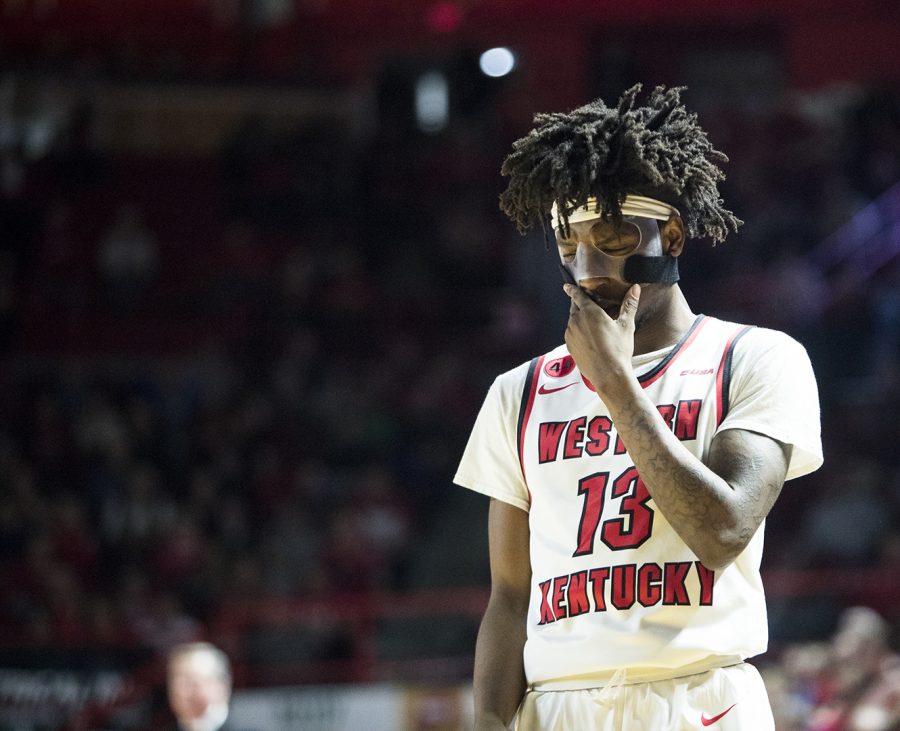 Freshman+guard+Taveion+Hollingsworth+wipes+his+face+during+a+game+against+Florida+Atlantic+University+on+Feb.+8.+Hollingsworth+put+up+20+points+that+night%2C+helping+the+Hilltoppers+to+a+75-63+win.
