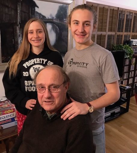 Ed Bohlander with his two kids. Bohlander died over the weekend after suffering a fall in Vietnam and being hospitalized with a coma for three months.
