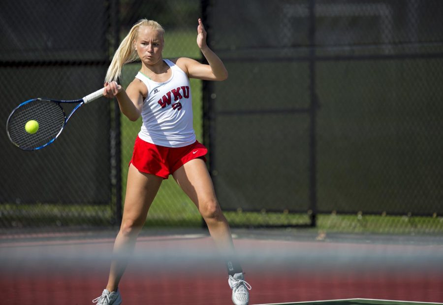 Sophomore+Monica+Malinen+plays+a+singles+match+against+East+Tennessee+State+University+April+13%2C+2017+at+the+WKU+tennis+courts.+Malinen%2C+alongside+her+doubles+partner+freshman+Moka+Ito%2C+defeated+a+Middle+Tennessee+State+University+pair+6-4.