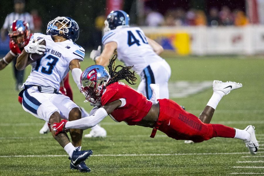 WKU’s Drell Greene (9) tackles Maines Jordan Swann (13) during WKUs game against Maine at Houchens Industries - L.T. Smith Stadium in Bowling Green on Saturday, Sept. 8, 2018. 