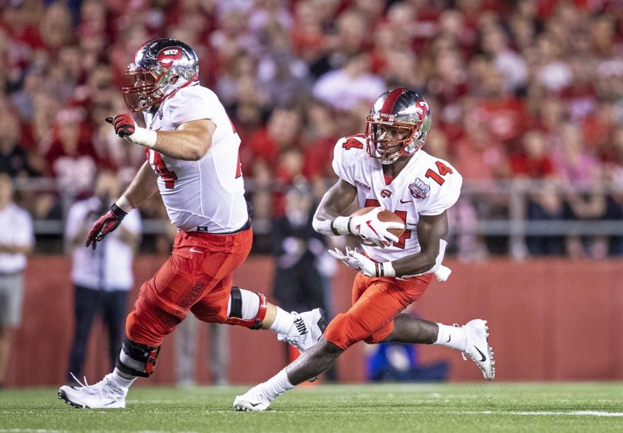Western Kentucky Hilltoppers running back Garland LaFrance (14) rushes the ball during the NCAA football game between the Western Kentucky Hilltoppers and Wisconsin Badgers at Camp Randall Stadium on August 31. CHRIS KOHLEY/HERALD