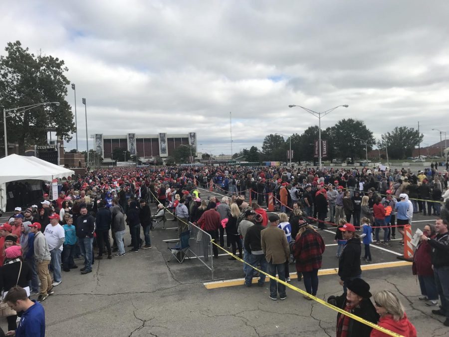 Thousands line up outside EKU Alumni Coliseum on Saturday afternoon waiting for President Trump to arrive to rally support for Congressional candidate Andy Barr.