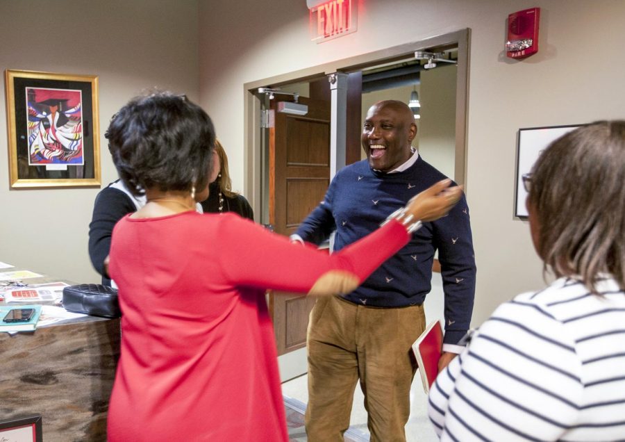 Nichols is greeted by ISEC director Martha Sales and her staff during a visit in November 2017 following his philanthropic gift to the center.