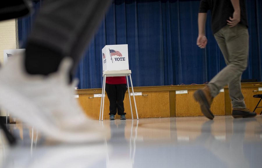 A woman casts their vote in the Kentucky midterm elections at the W. R. McNeill Elementary School on Tuesday, November 6.