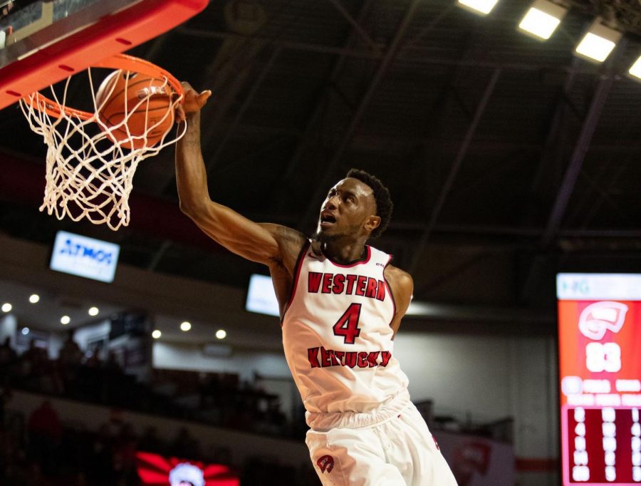 WKU forward Josh Anderson throws down a dunk during WKUs 88-74 win over Tennessee State. Anderson had 15 points. 