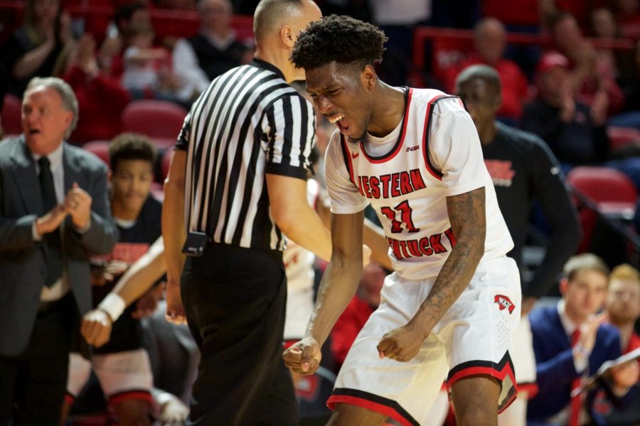 Taveion Hollingsworth celebrates during the Hilltoppers 72-66 victory over Florida Atlantic on Saturday at Diddle Arena.