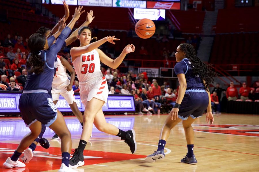 Freshman guard Meral Abdelgawad makes a pass during the Lady Toppers win over Old Dominion on Saturday.
