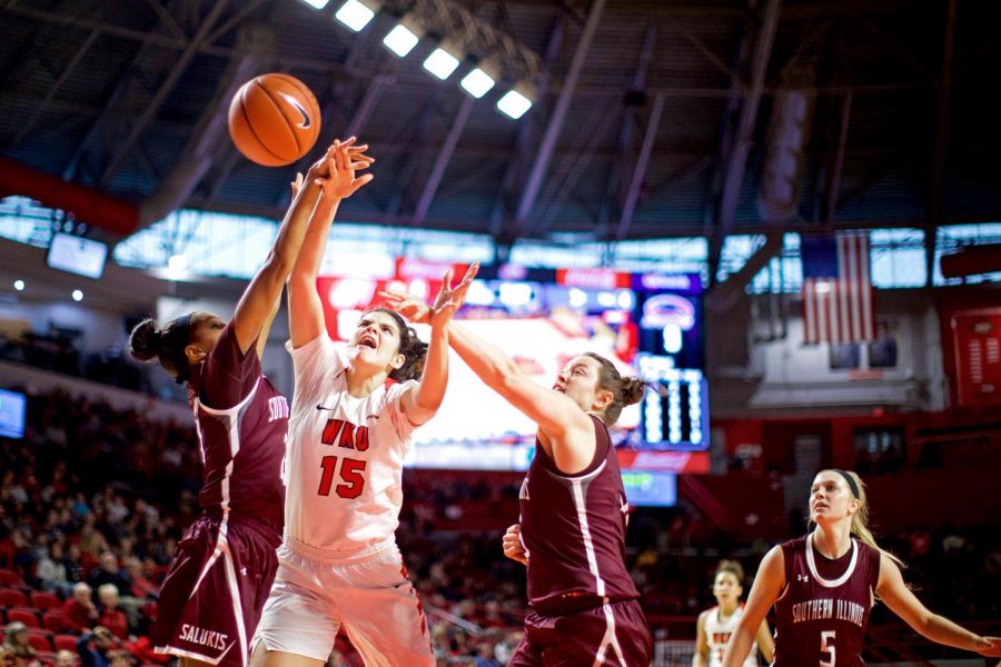 Ladytopper Raneem Elgedawy drives to the net while being fouled by Southern Illinois Universitys defense at EA Diddle Arena on Nov. 20.
