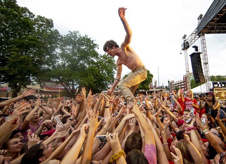 Cage the Elephant lead singer Matt Shultz crowd surfers during Cage the Elephants performance before the first WKU home football game vs Maine on Saturday, Sept. 8 on WKUs campus.