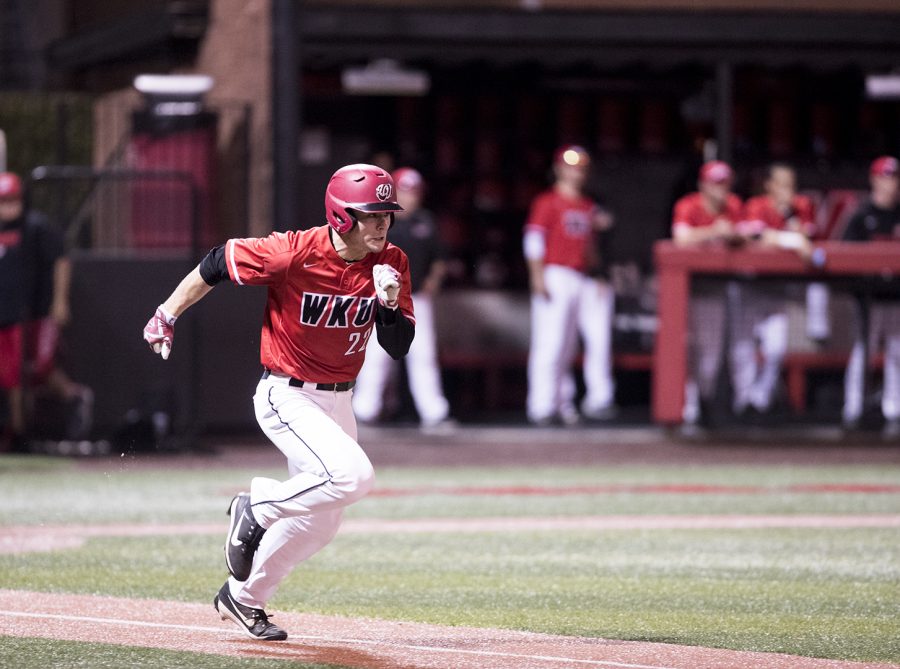 Freshman outfielder Luke Brown (22) runs to first base against the LA Tech Bulldogs on Friday, April 27. Brown scored a run in the Hilltoppers 6-1 victory at Nick Denes field.