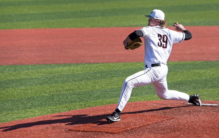 Freshman Maddex Richardson, pitches during the game against West Virginia Sunday, March 4 at Nick Denes Field. The Toppers lost with a final score of 7-1.