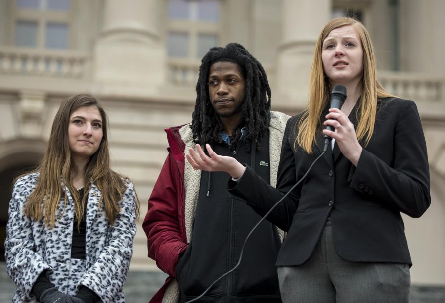WKU student body president Andi Dahmer (left), Kentucky State University student body president Onaje Cunningham (center) and Eastern Kentucky University student body president Laura Jackson (right) speak in front of the capital building in Frankfort Feb. 6. Eight Kentucky universities were represented at the rally to talk to representatives about their plans for the higher education tax reform.