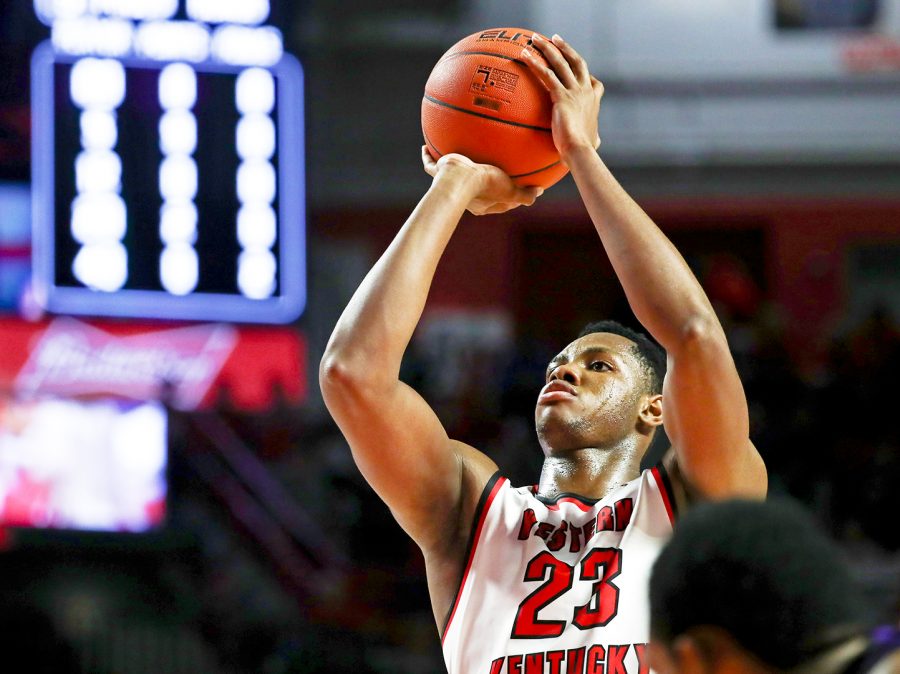 WKU freshman guard Charles Bassey (23) shoots a free-throw during an exhibition match vs Kentucky Wesleyan in E.A. Diddle Arena on Saturday, Nov. 3.