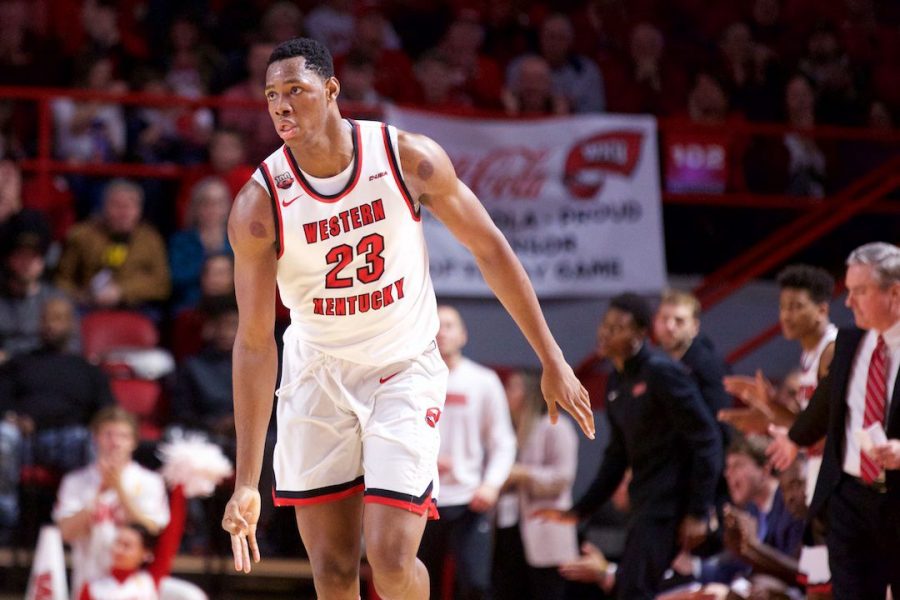 Charles Bassey (23) celebrates after making a shot against Wisconsin in Diddle Arena Dec. 29 in Bowling Green. Bassey had 19 points and six rebounds in the win. 