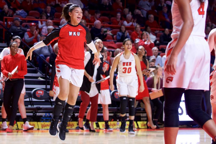 Freshman+center+Kallie+Searcy+jumps+with+enthusiasm+for+the+WKU+squadas+a+timeout+is+called+by+Middle+Tennessee+State+during+the+Lady+Toppers+last+home+game+of+the+season+in+Diddle+Arena+on+March+7+in+Bowling+Green.+The+Lady+Toppers+bested+MTSU+67-56+and+head+on+the+road+for+the+Conference+USA+Tournament+next+week+in+Frisco%2C+Texas.