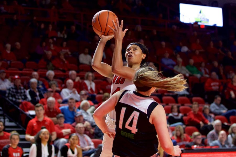 Redshirt junior guard Dee Givens takes a shot during the Lady Toppers 85-55 victory over Marshall at Diddle Arena on Saturday.