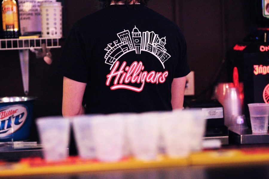 A bartender prepares a group of drinks at Hilligans during the Back-2-School drink special on Jan 22, 2011.