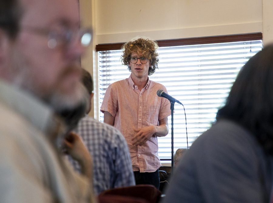 Conner Hounshell, speaks in front of faculty and staff during the Faculty Senate meeting in the faculty house on Thurs. April 8, 2019.