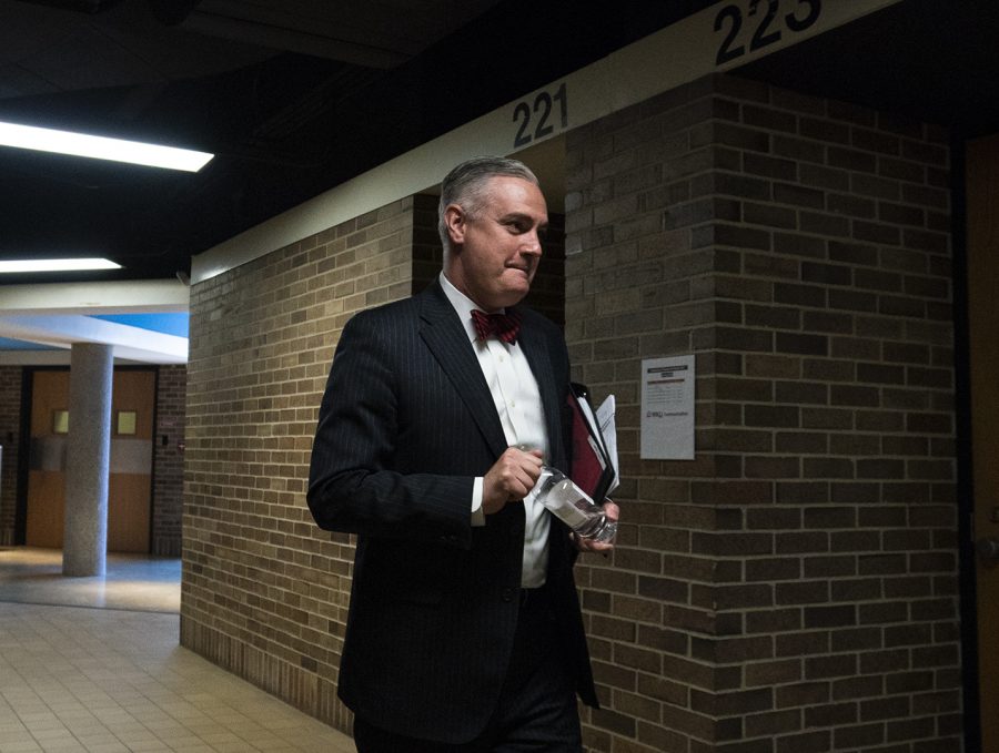 WKU President Tim Caboni walks out of a conference room in FAC after meeting with the heads of each department to discuss moving forward after Larry Snyders resignation on Tuesday, April 2, 2019.