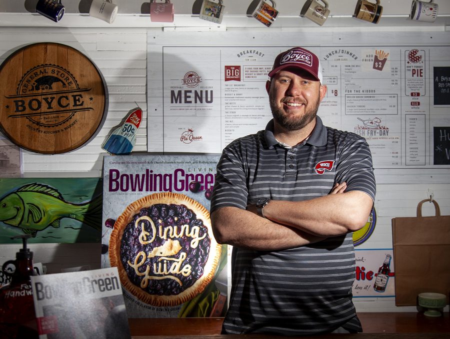 Brad Golliher, editor of the Bowling Green Living magazine, poses for a portrait at the Boyce General Store. “Working from home as an editor for the Bowling Green Living magazine has enabled me to also help out with the store and taking care of my kids,” Golliher said.