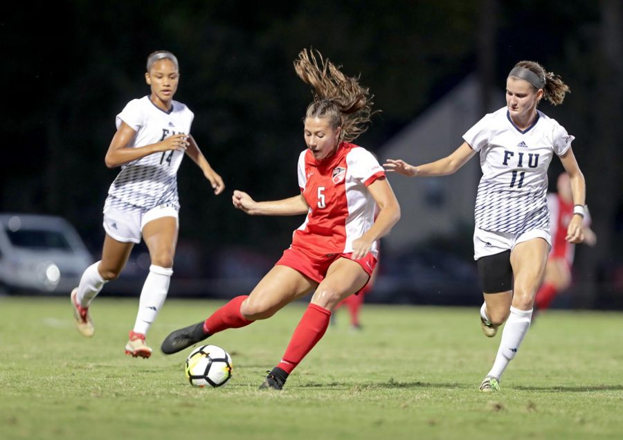 Chandler Backes, WKU Junior, gets a lead on the ball and moves it accross the field right before WKU gets their second goal of the night. WKU won the game 4-0 against FIU on Friday, October 5.