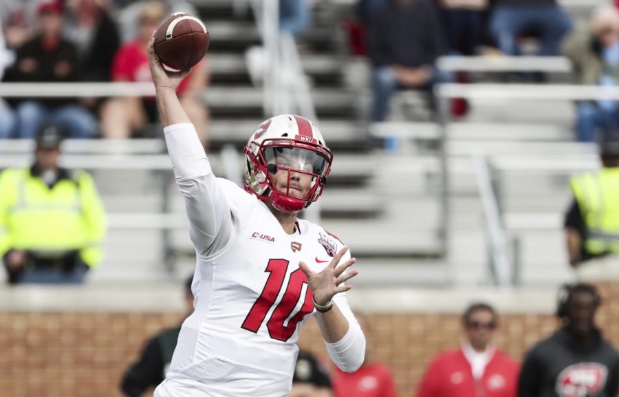 Steven Duncan throws a pass in WKUs game against Ball State on Saturday. The Hilltopper quarterback had 94 passing yards and 55 rushing yards in the 28-20 win. 