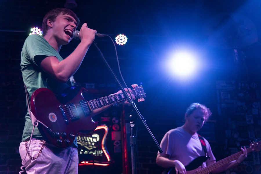 Harlan Cecil, left, performs alongside bassist Colby Grant, right, as two thirds of the band Sour Cream, at a show hosted by Tidballs on Saturday, September 21, 2019. Sour Cream, who is based out of Lexington, headed straight to Bowling Green for the show at Tidballs after they had played at the Tahlsound Music Festival earlier that day.