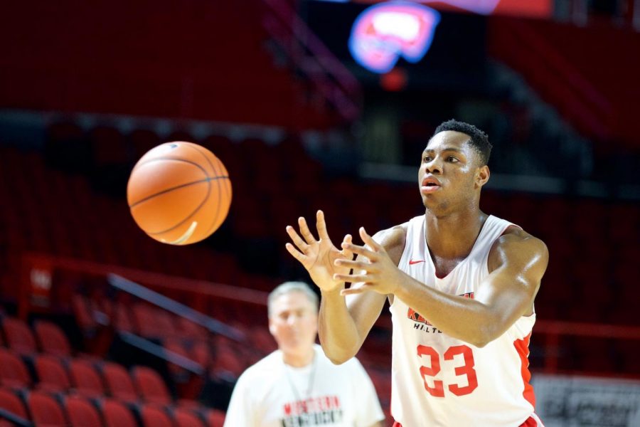 Freshman+center+Charles+Bassey+receives+a+pass+while+practicing+his+shooting+during+the+Hilltoppers+first-ever+basketball+pro+day+in+Diddle+Arena+Thursday.+Bassey+came+to+WKU+as+a+consensus+five-star+recruit.%C2%A0%C2%A0