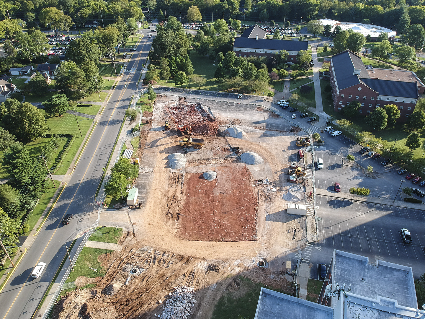 Construction equipment on the site of construction for what will be the First Year Village by Bemis Lawrence hall on Saturday, Aug. 24, 2019.