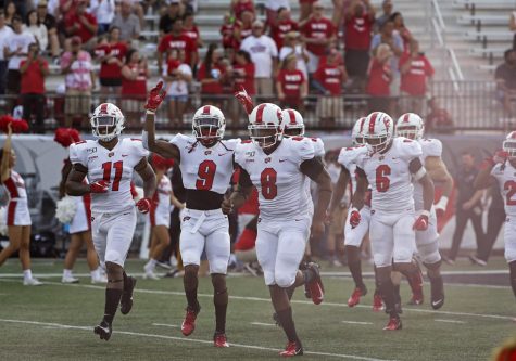 The WKU football team takes the field before playing against The UAB Blazers at Houcens-Smith Stadium. WKU won 20-13.