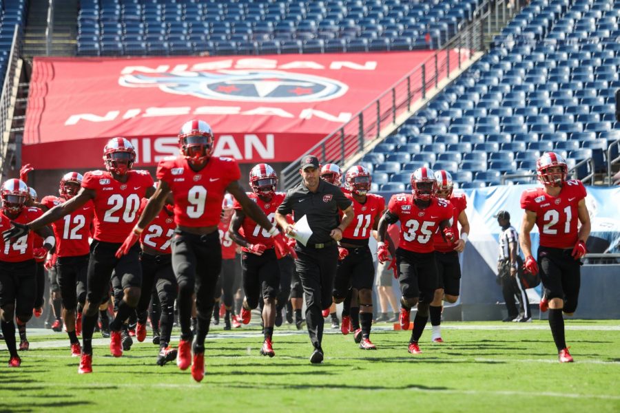 WKU+head+coach+Tyson+Helton+leads+his+squad+on+to+the+field+to+play+in-state+adversary%2C+the+Louisville+Cardinals+on+September+14%2C+2019+at+Nissan+Stadium.+Louisville+won+38-21.