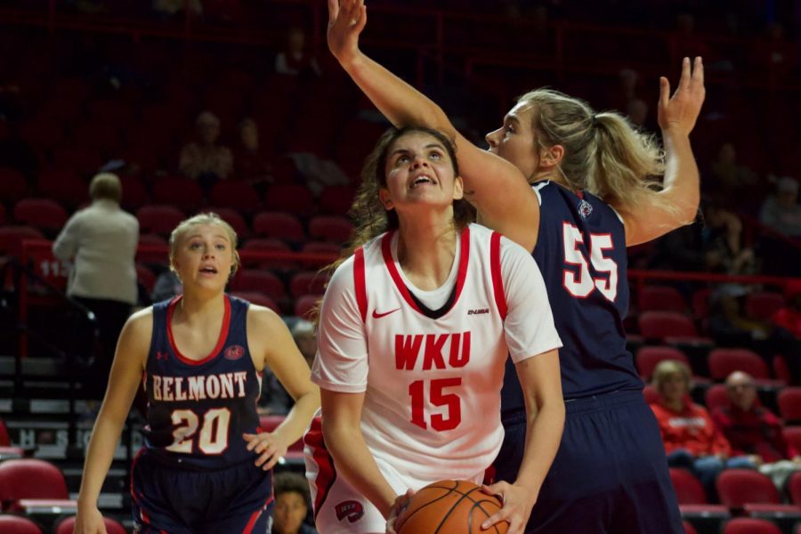 Junior forward Raneem Elgedawy (15) battles with Belmont senior forward Maddie Wright (55) during the Lady Toppers game against Belmont in Diddle Arena on Wednesday, Nov. 13 in Bowling Green.